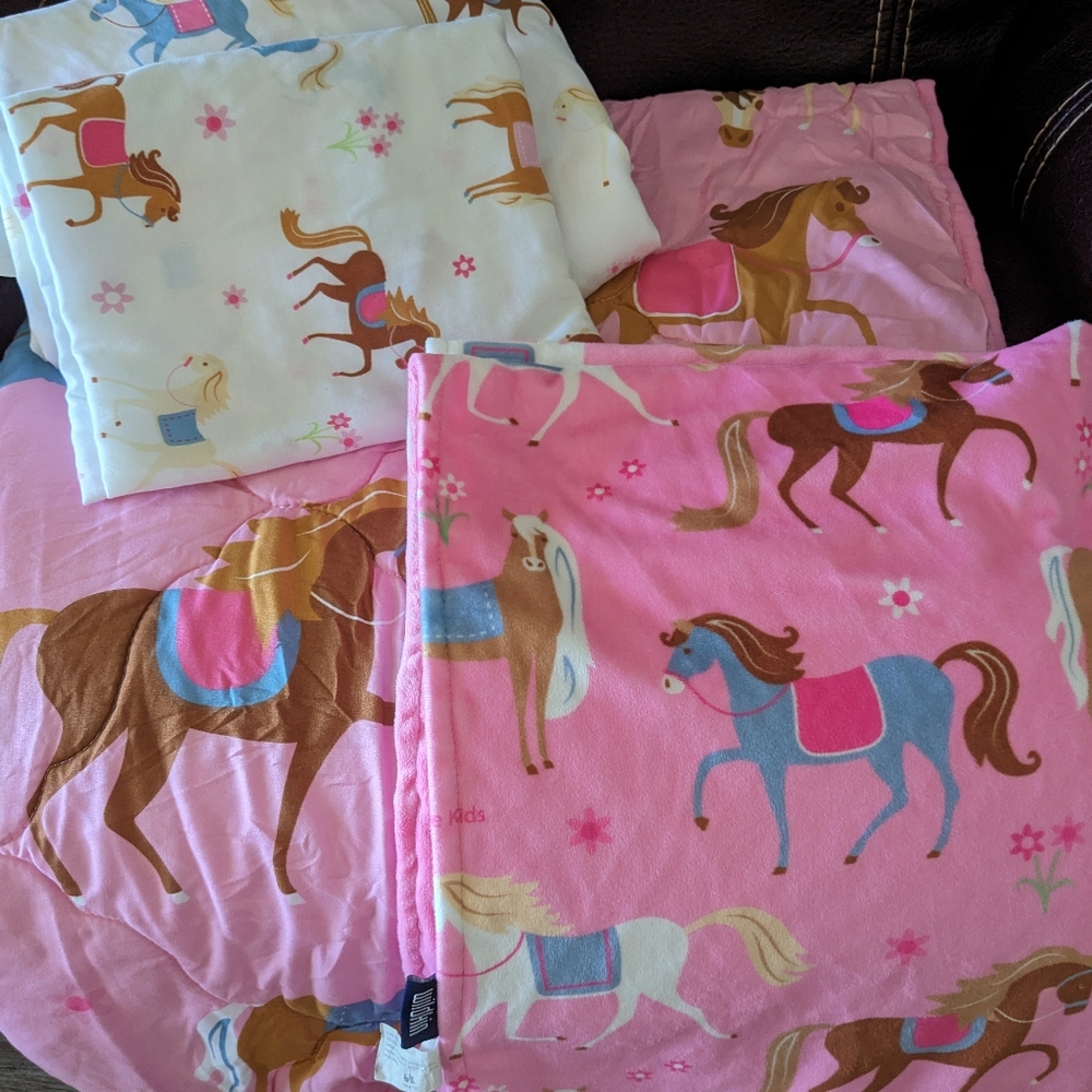 5 piece pink horse toddler bedding set. Sheet set, comforter and soft throw blan